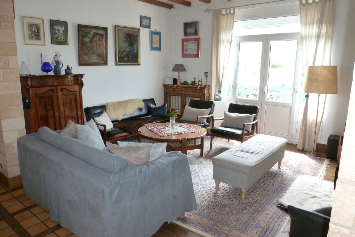 Salon avec TV pour vous octroyer une pause détente