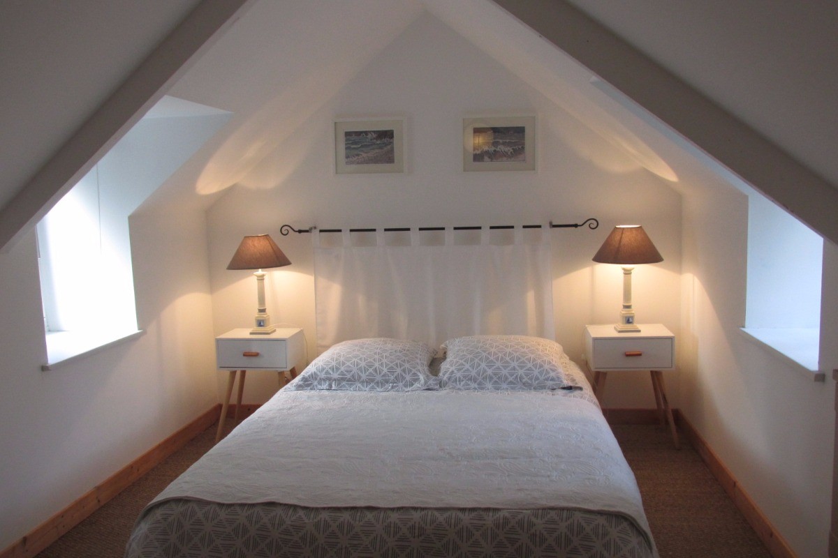 Chambre en mezzanine lit fait à l'arrivée