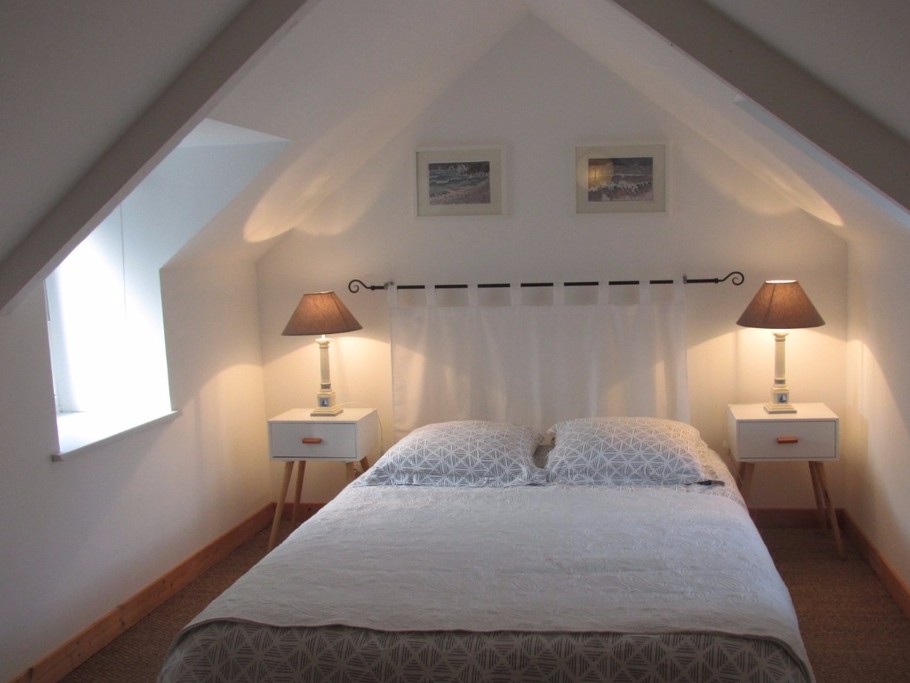 Chambre en mezzanine lit fait à l'arrivée