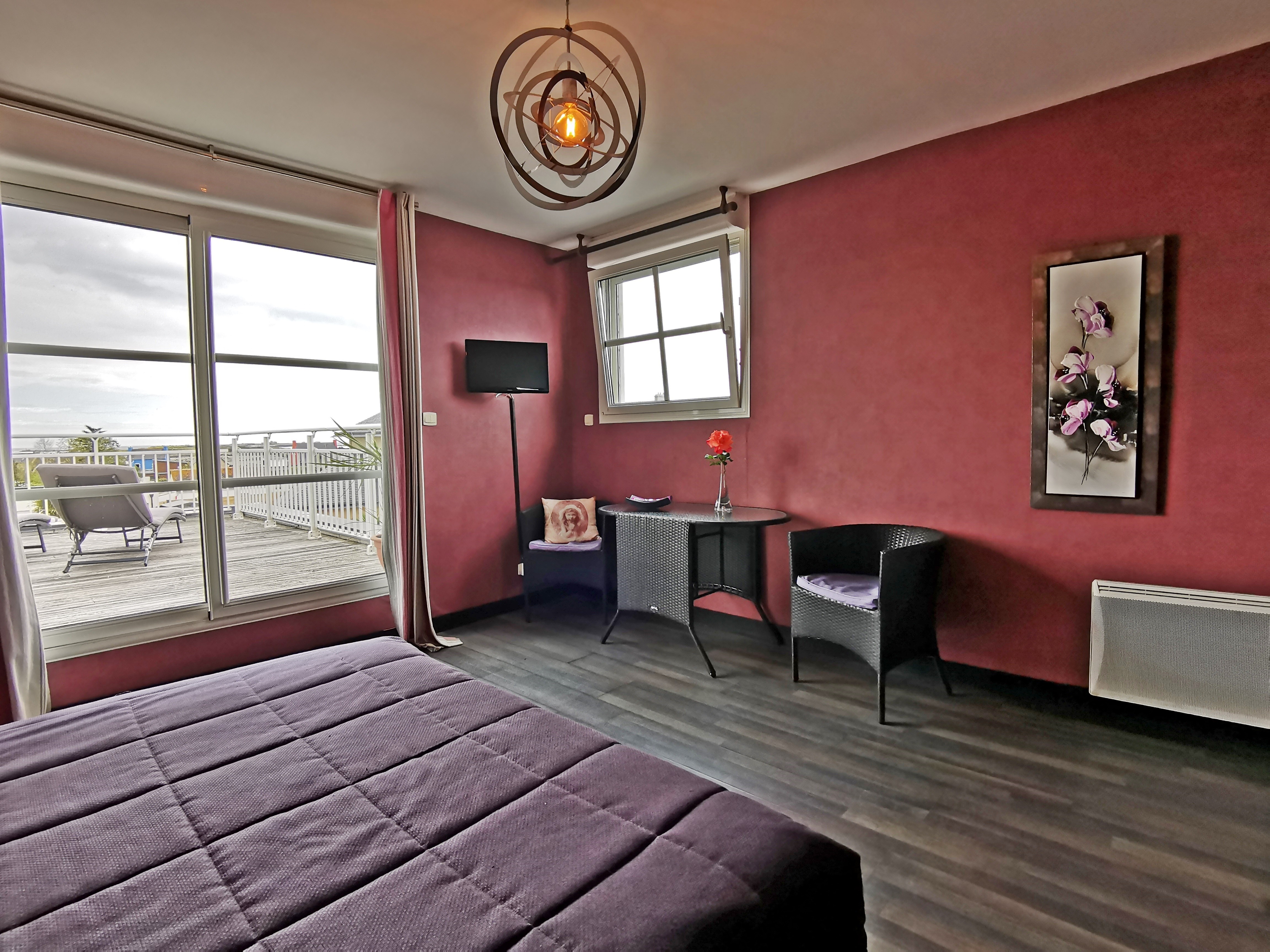 bedroom with lounge area