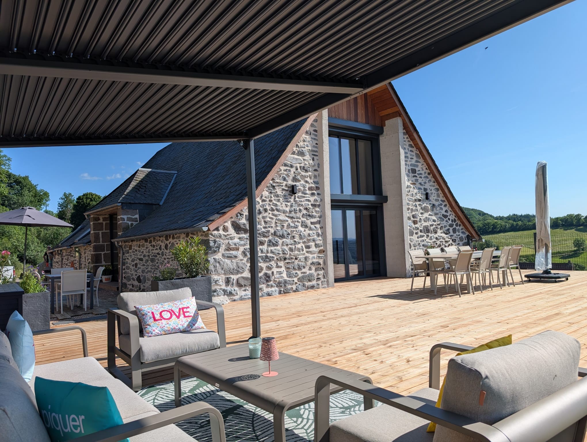 Exterior façade and terrace with pergola
