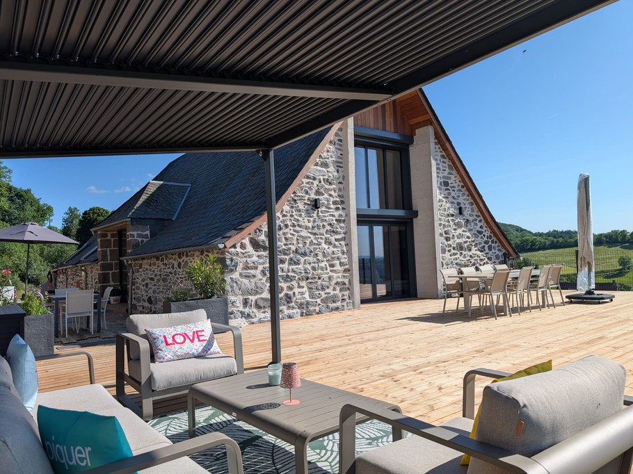 Exterior façade and terrace with pergola