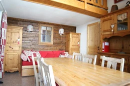 Location d'un appartement aux Menuires 3 Vallées - pièce de vie