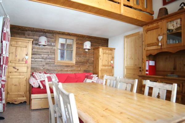 Location d'un appartement aux Menuires 3 Vallées - pièce de vie