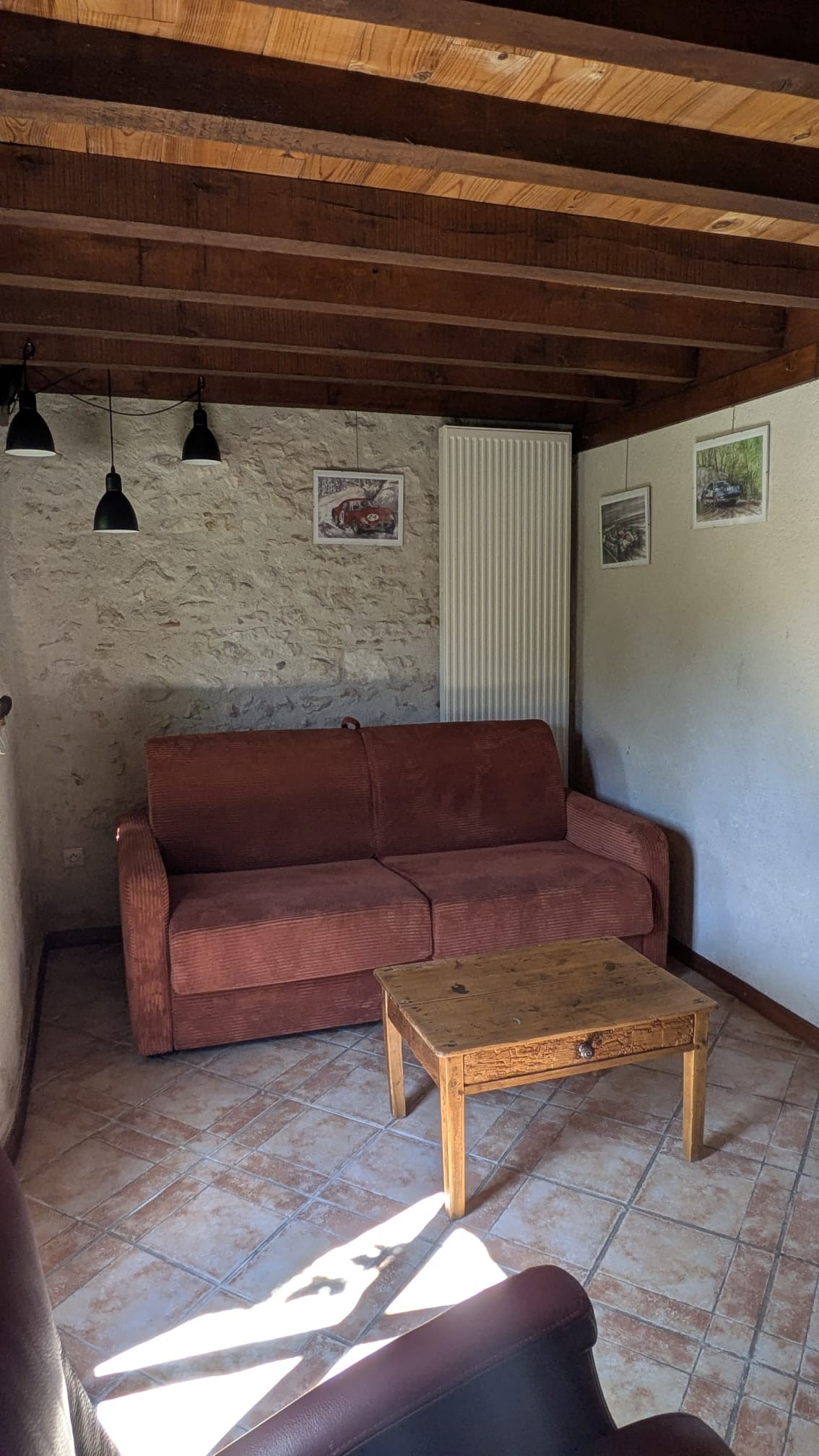 small sitting room with a fold-out sofa for guests