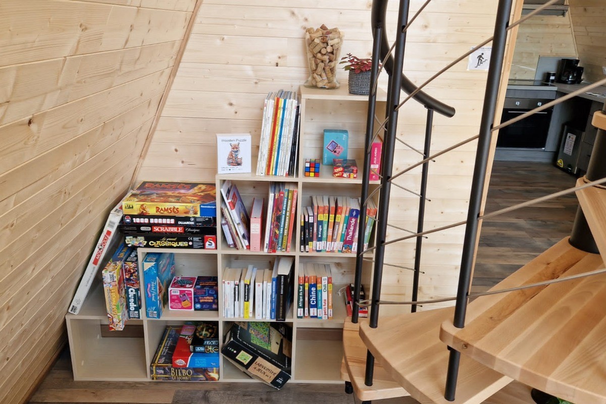 Chalet Renard - Coin bibliothèque et jeux de société
