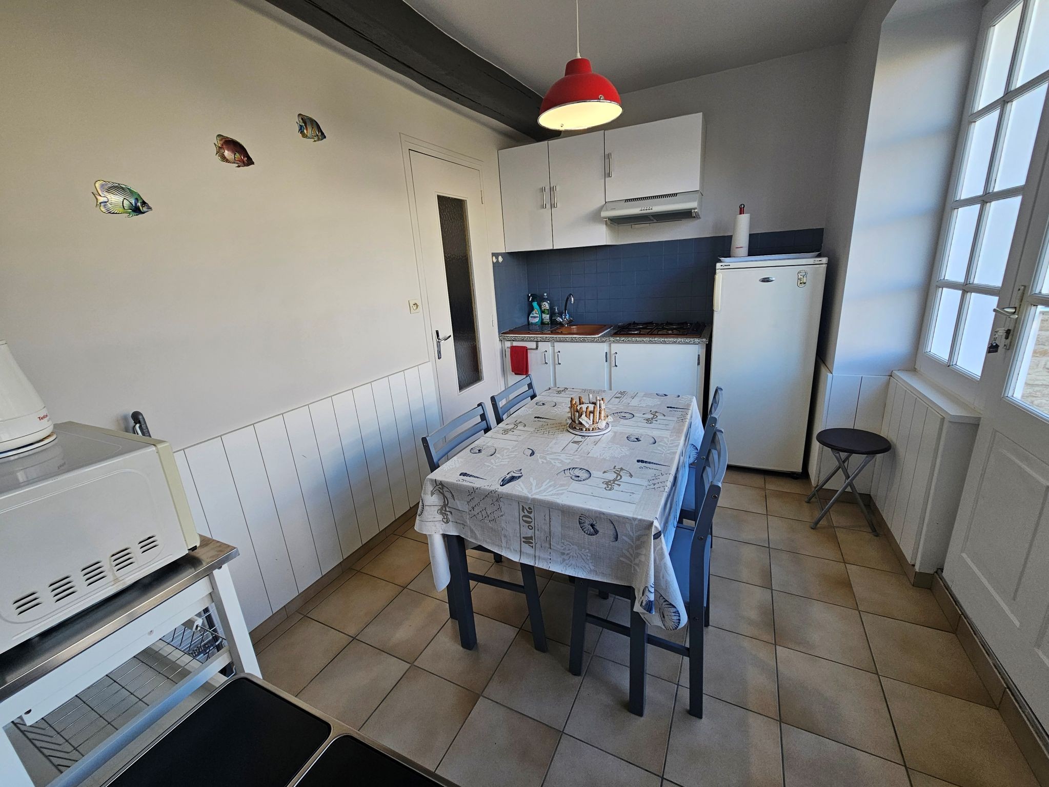 La cuisine à privatisé par les voyageurs auprès de la propriétaire Céline