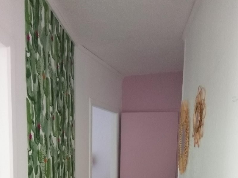 Le couloir qui mène aux chambres