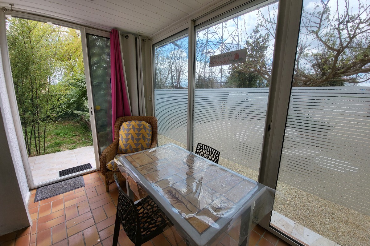 véranda avec vue sur le jardin