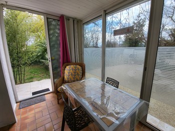 véranda avec vue sur le jardin