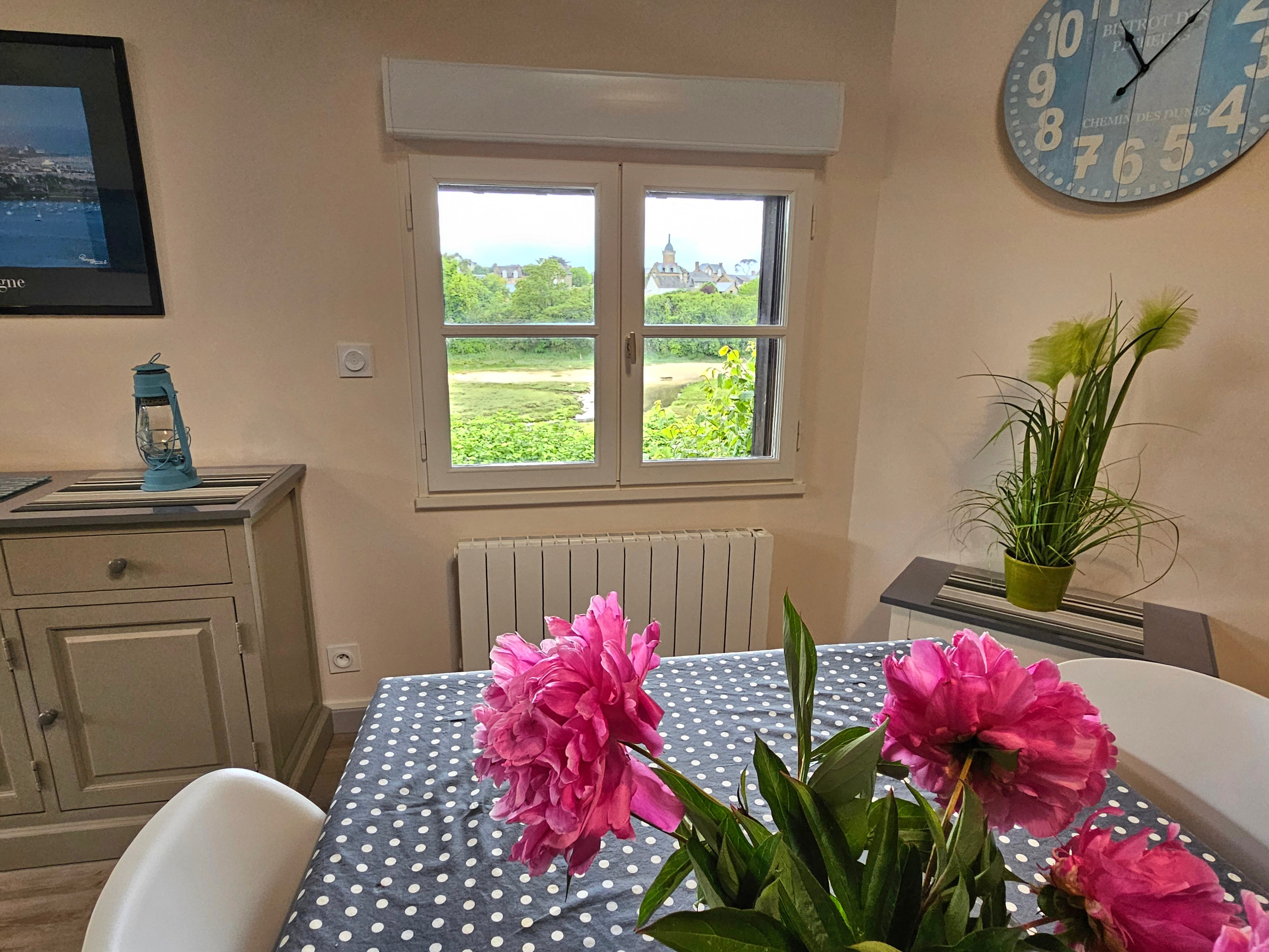 Living room with fitted kitchen, lounge and sitting area. Access to private terrace.