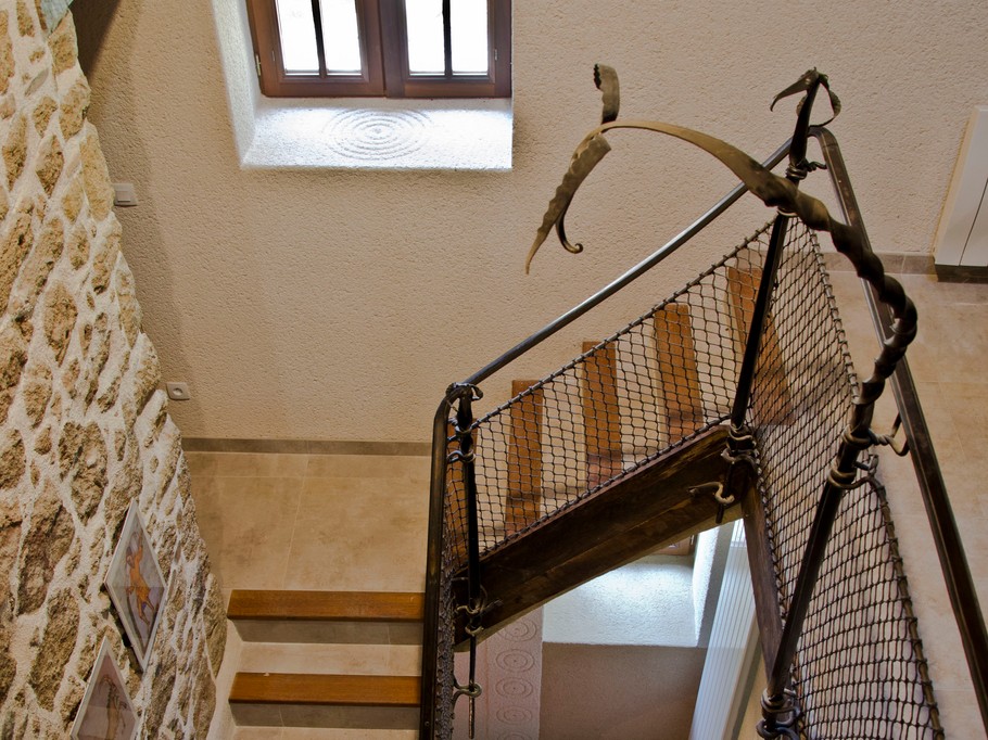 Détail de la main courante, joliment ouvragée