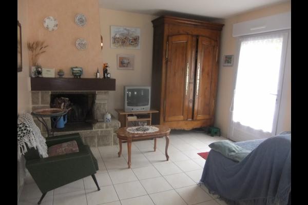 Location - Maison de vacances - Plaintel - Salon avec cheminée