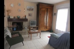 Location - Maison de vacances - Plaintel - Salon avec cheminée