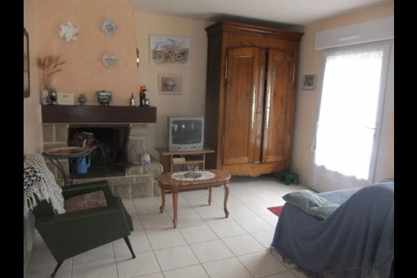 Location - Maison de vacances - Plaintel - Salon avec cheminée