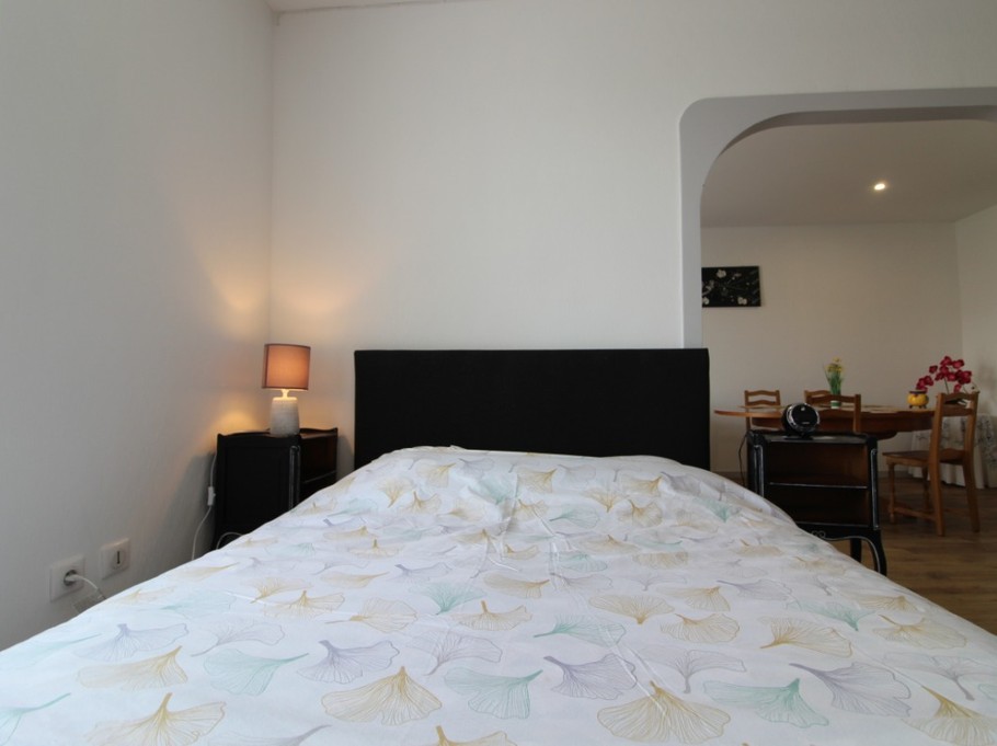 Coin chambre - Appartement Chez Reine - Location de vacances - Étival-Clairefontaine