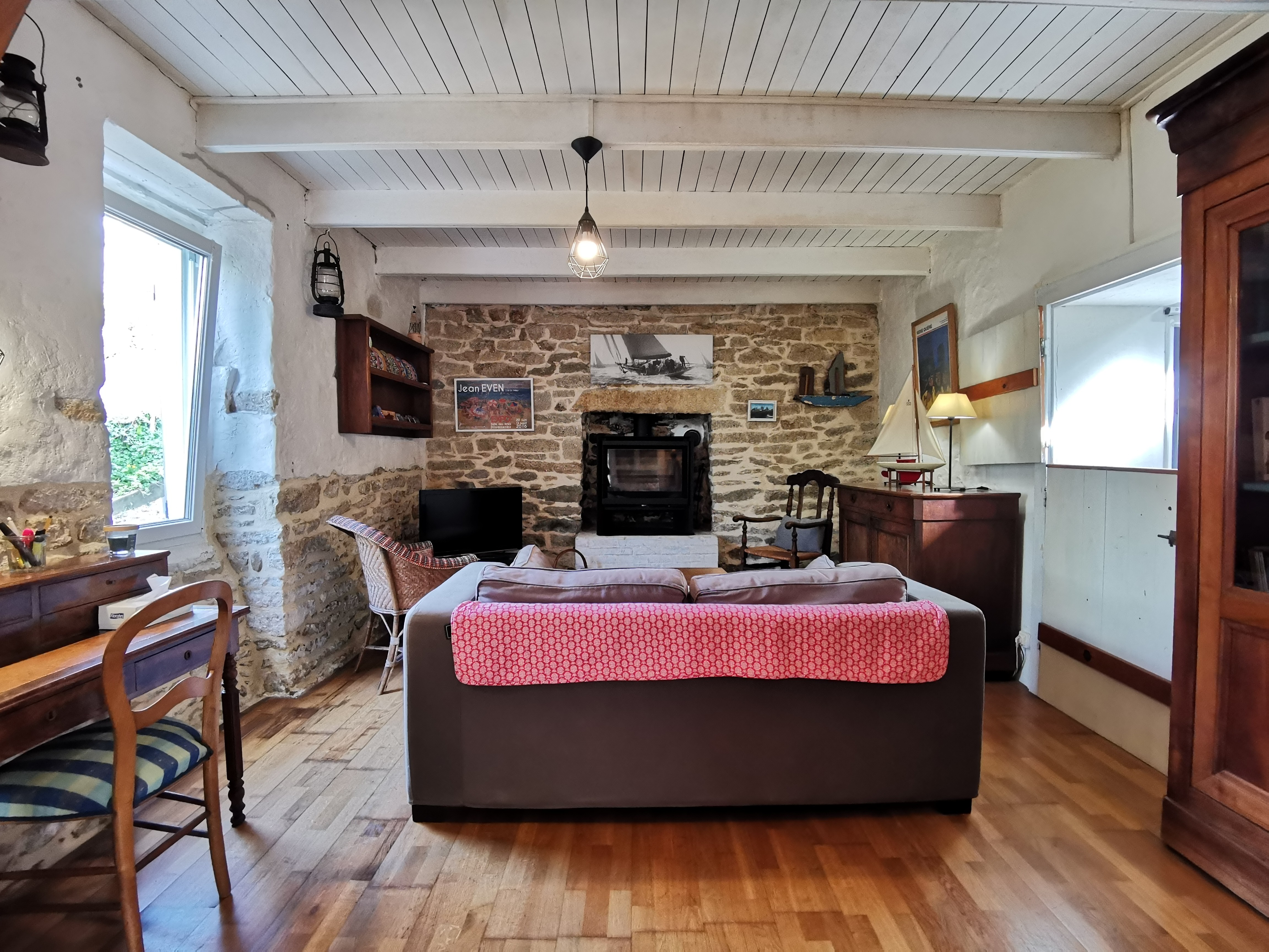 separate living room with wood-burning stove