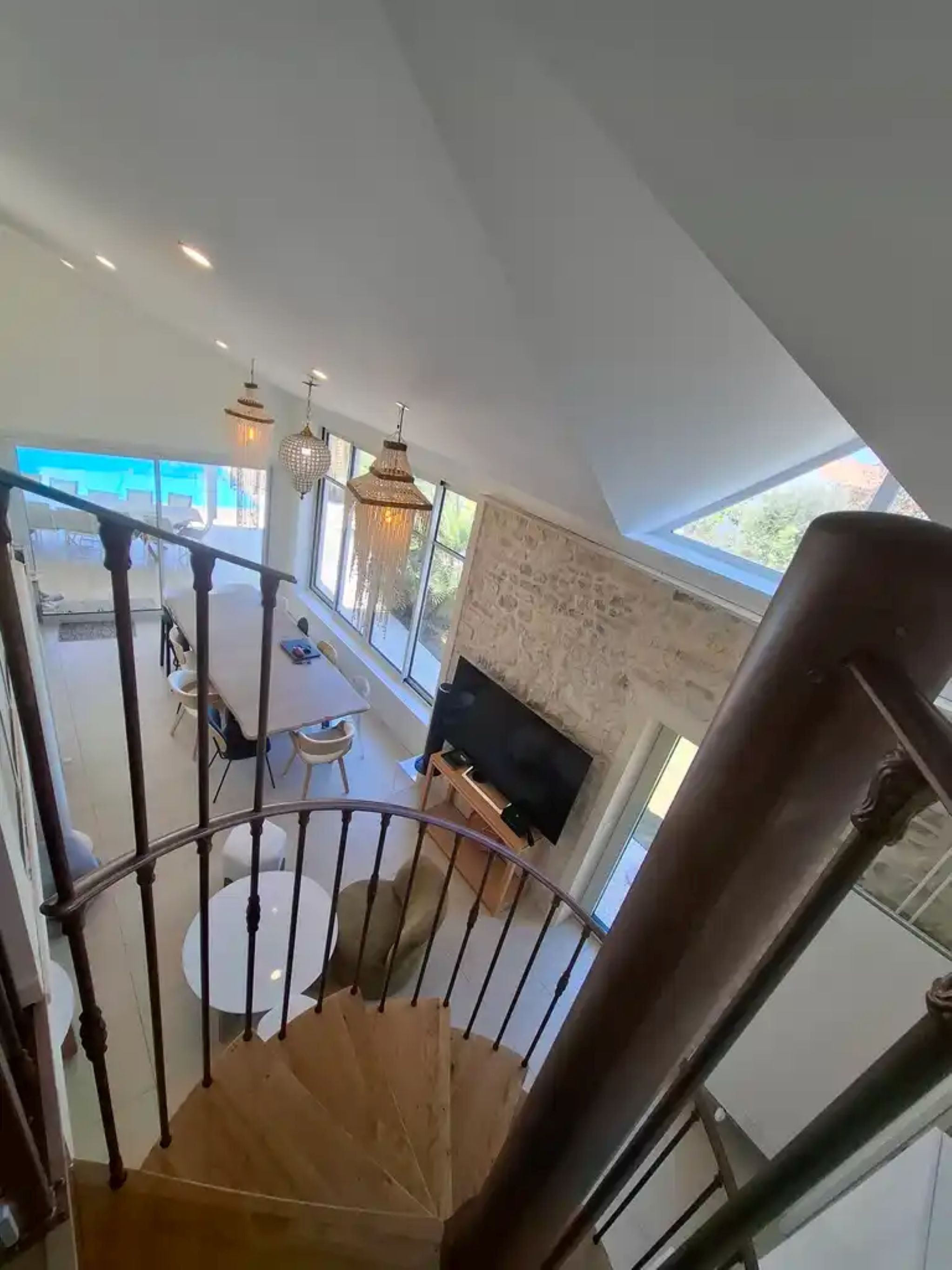 At the top of the stairs leading to the three bedrooms and the shower room
