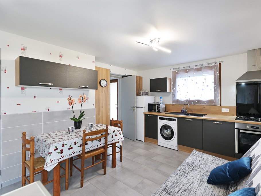 Cuisine ouverte sur salon séjour - Appartement RDC Aumontzey