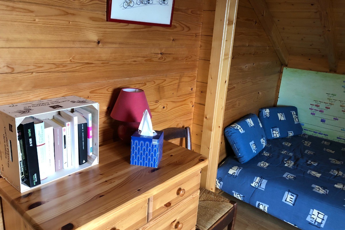Chalet Chez Léon - Mezzanine coin bibliothèque