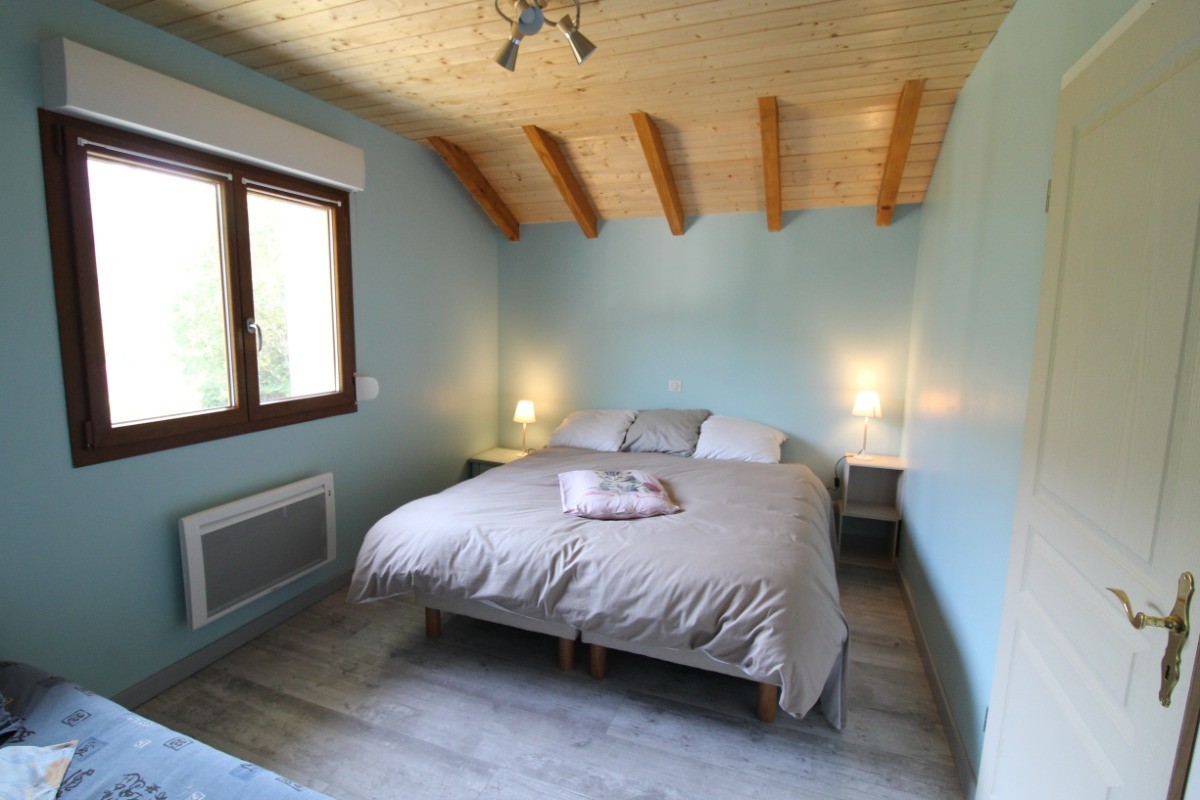 Chambre 1 Disposition 1 grand lit double et 1 lit simple