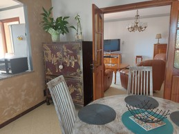 Salle à manger communicante avec le salon