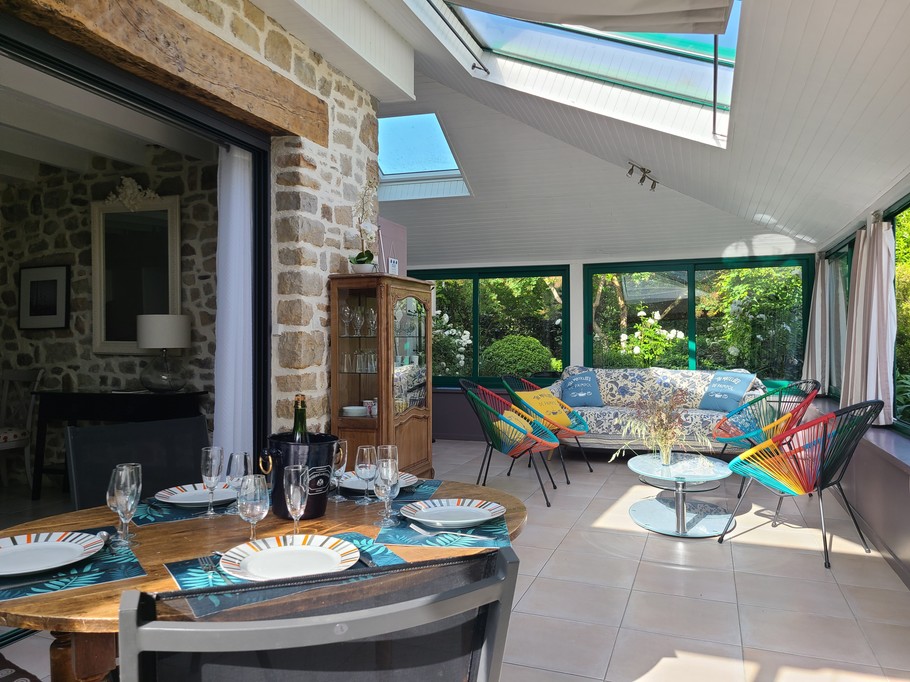 Veranda opening onto living room and kitchen