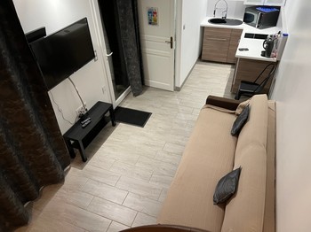 Gîte rouge cuisine / salon