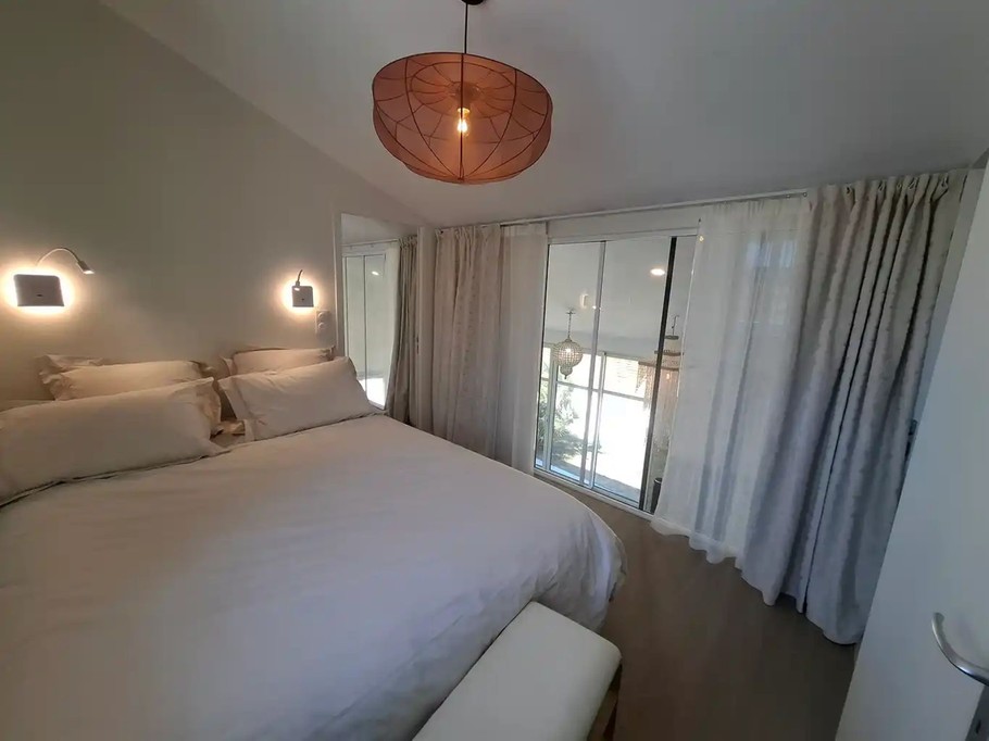 Two adjoining bedrooms on the first floor with blackout curtains