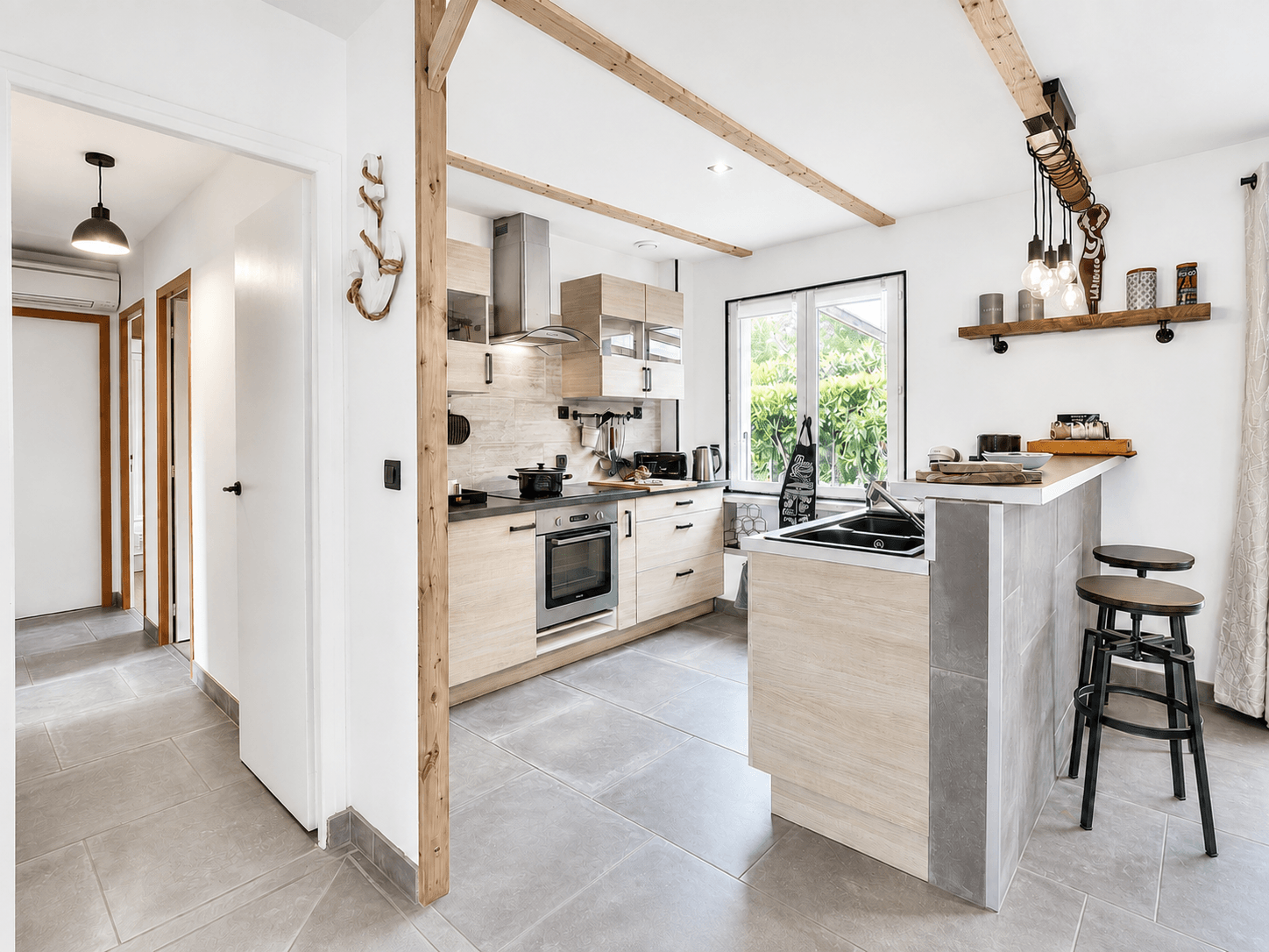 Open-plan kitchen with a bar