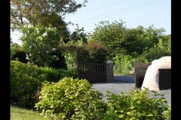 Entrance to the inner courtyard and its well
