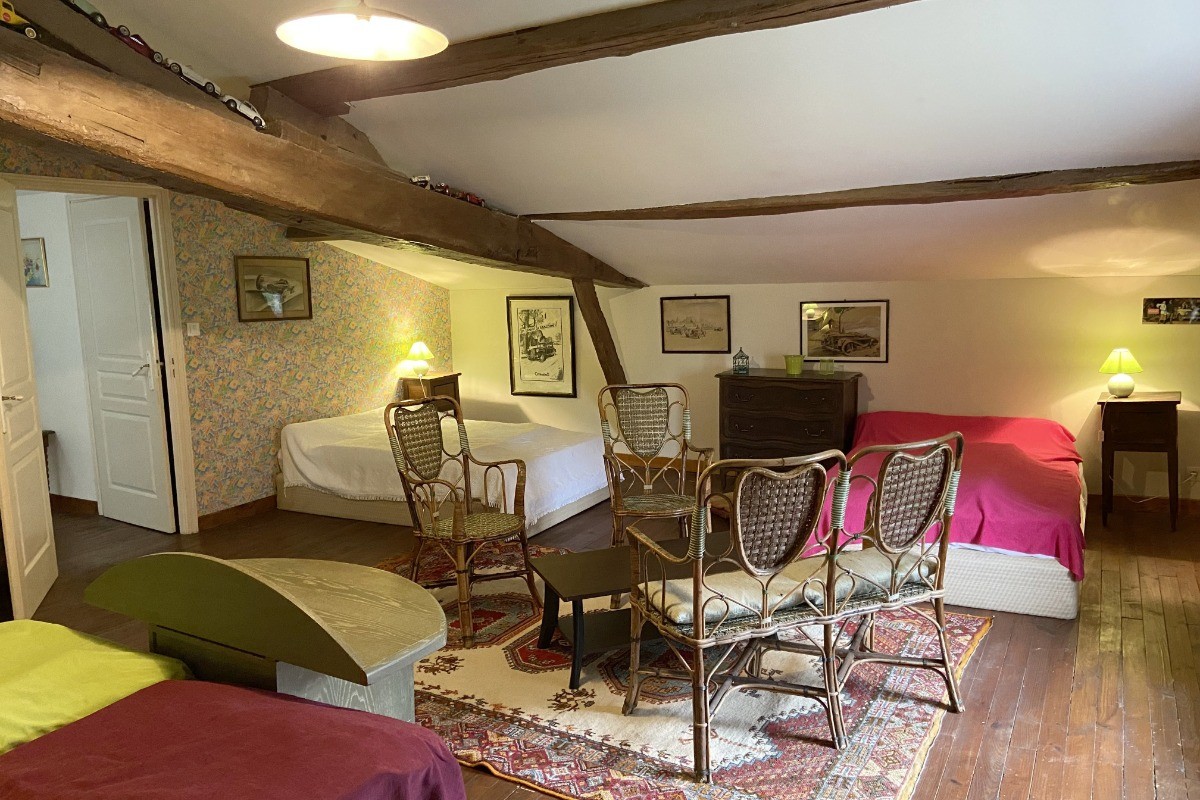 Chambre à l'étage avec 4 lits