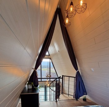 Chambre dans la mezzanine - Chalet Ecureuil