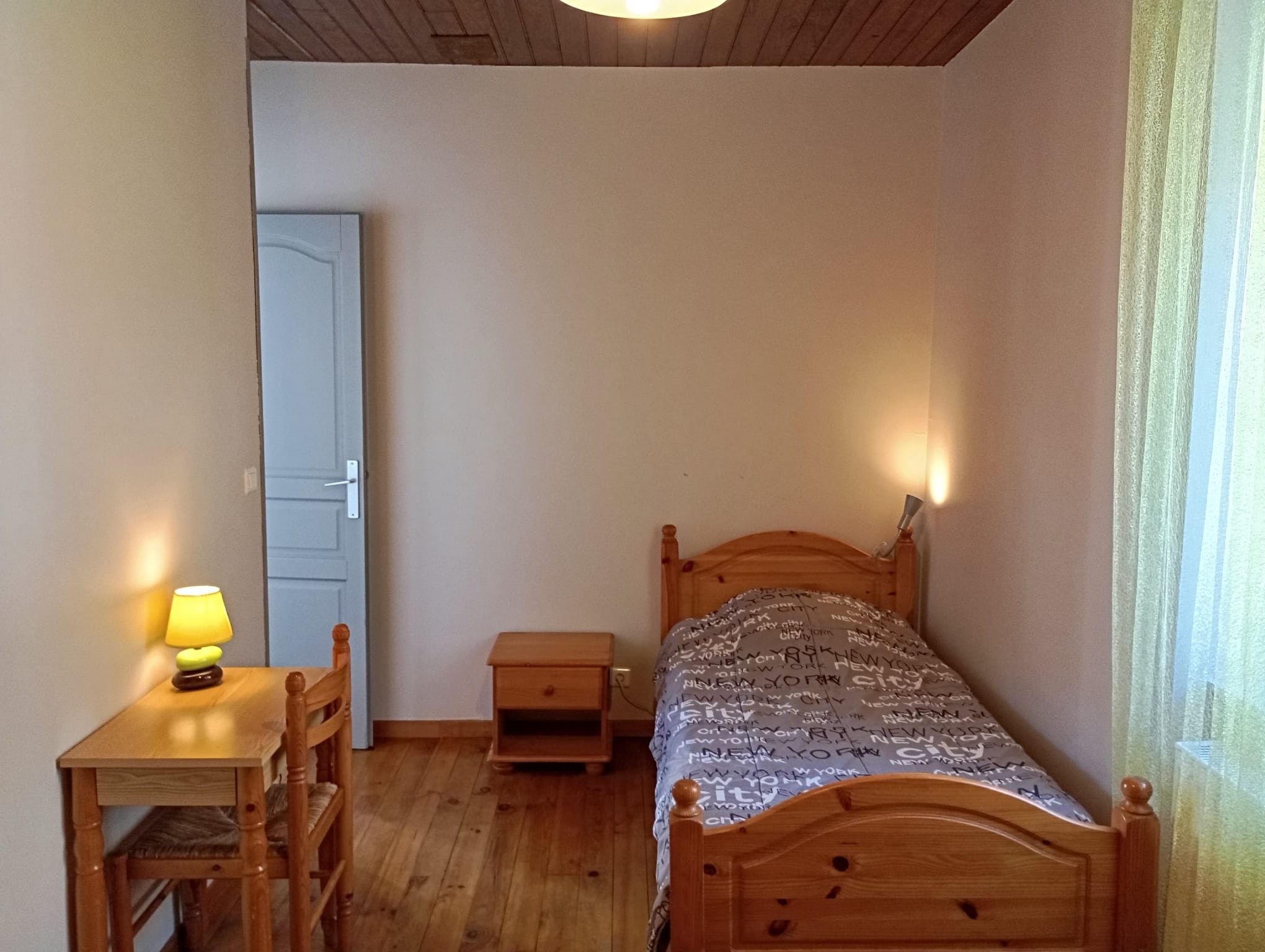 Bedroom 4 with 3 single beds overlooking the park