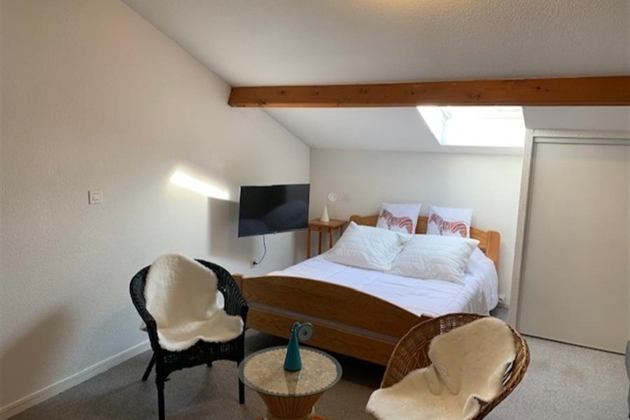 Mezzanine avec un lit en 140