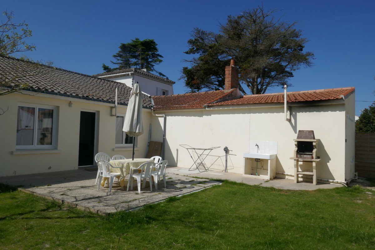 Maison mitoyenne de plain-pied avec jardin clos