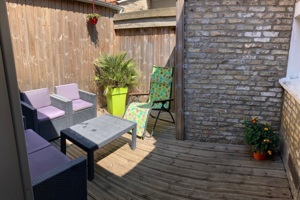 Terrasse entièrement clos.