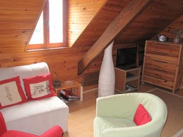 Studio Joubarbe - Coin salon avec fauteuil-lit