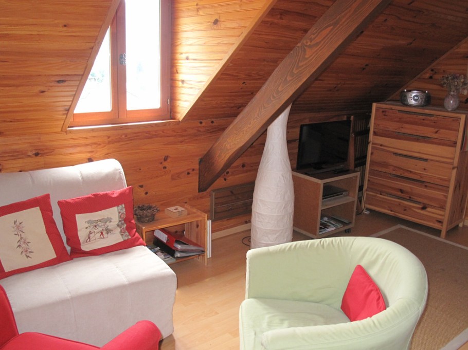 Studio Joubarbe - Coin salon avec fauteuil-lit