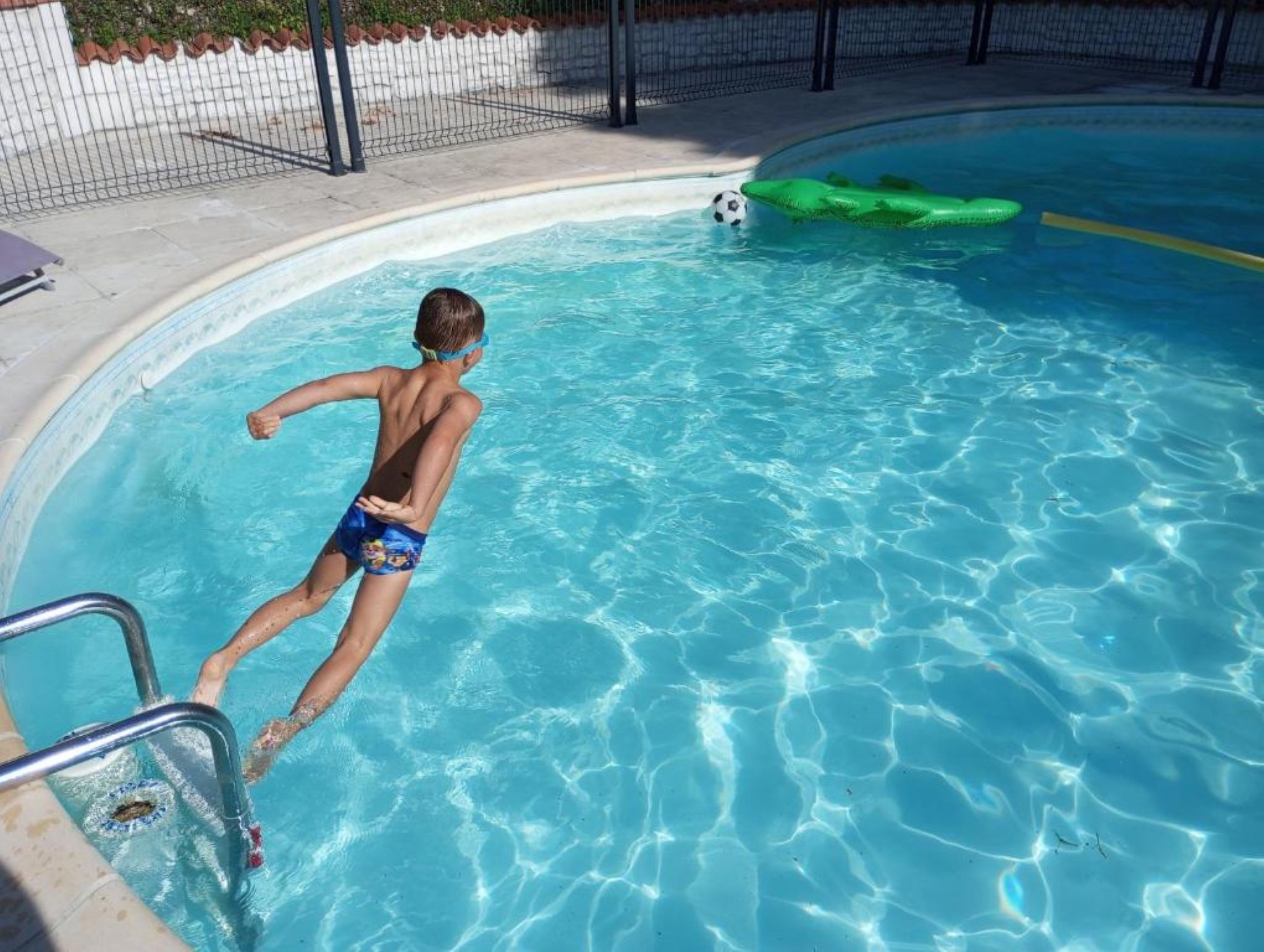 Shared, secure swimming pool at Les Ormes de Belluire property in Charente maritime