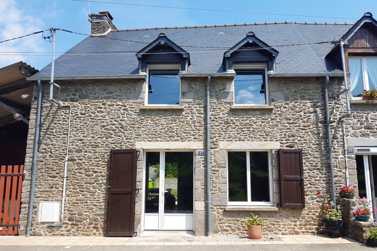 Façade de l'ancienne longère, parfaitement restaurée.
Crédits photo : Clévacances 35