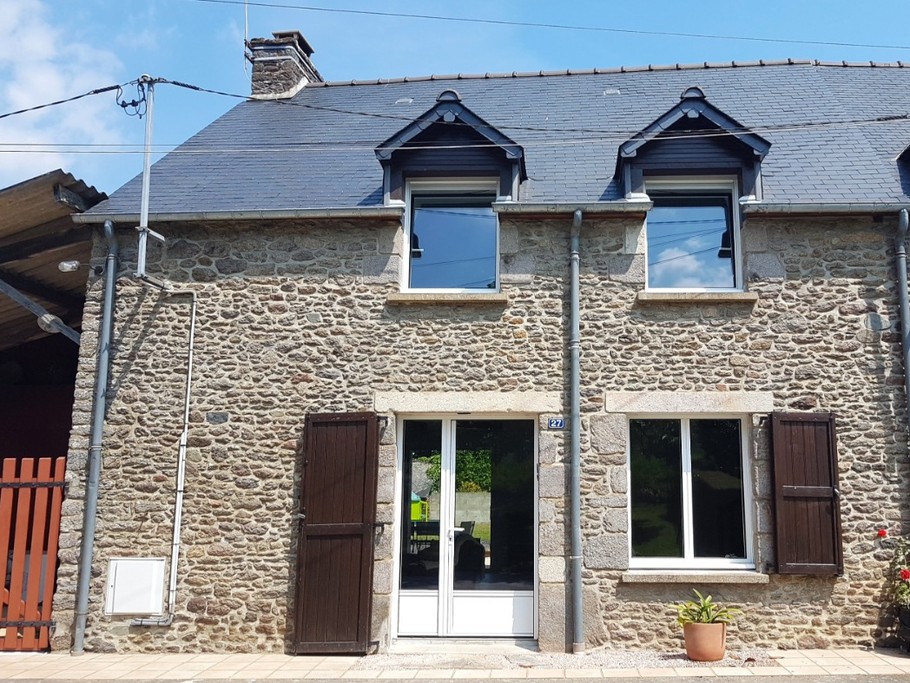 Façade de l'ancienne longère, parfaitement restaurée.
Crédits photo : Clévacances 35