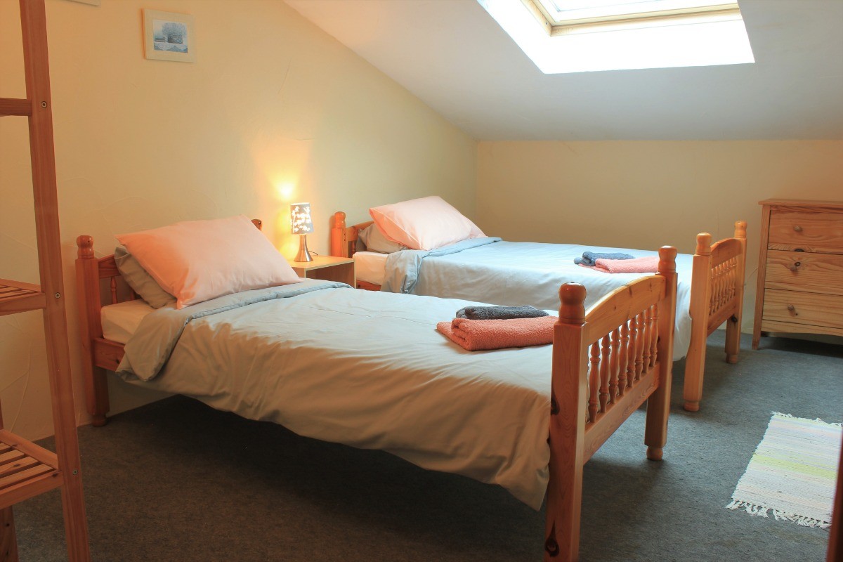 Une quatrième chambre double à l'étage