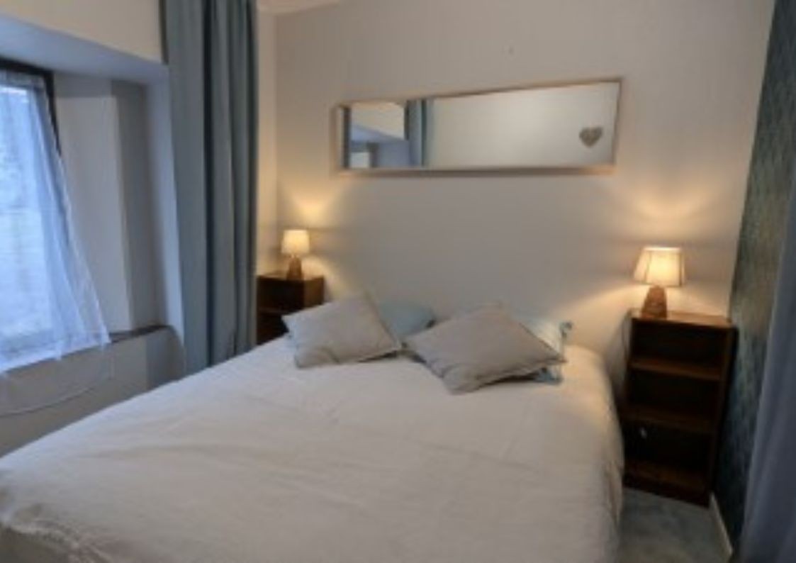Comfortable double room in the gîte at Le Claux in the Cantal