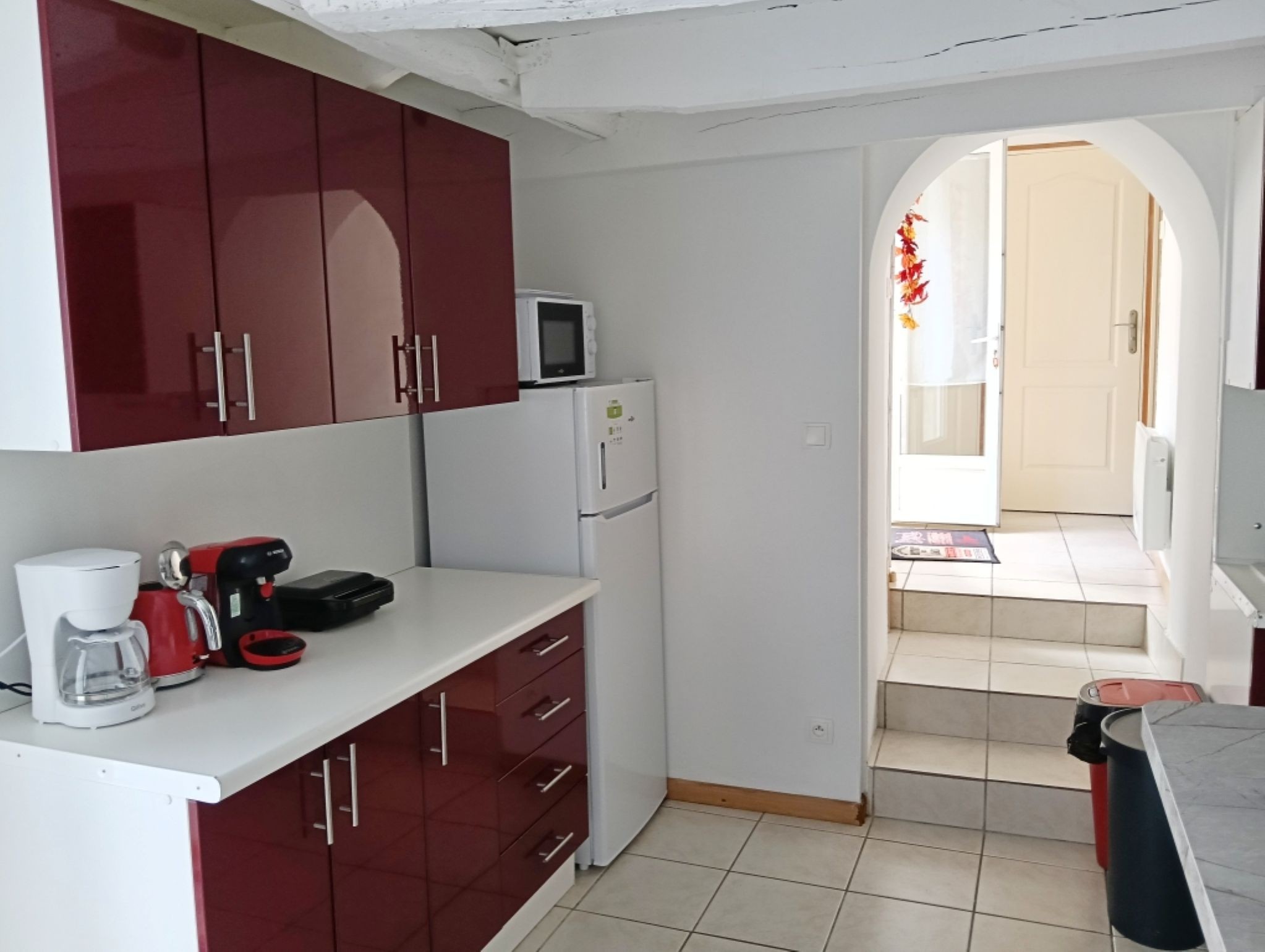 Access to the shower room, separate WC and laundry room of the Gîte O Scope near Futuroscope
