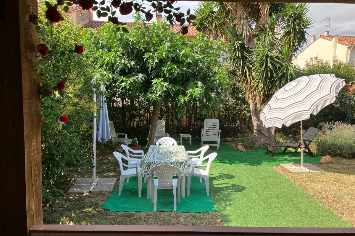 Jardin clos arboré et aménagé