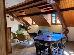 Three areas at the entrance to the home, a dining area with china cabinet, a kitchen area with independent lighting and the living room also with independent lighting