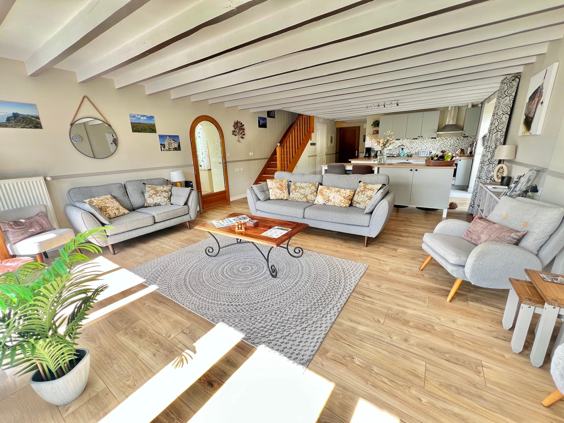 Large open-plan lounge with comfortable seating for 7 people