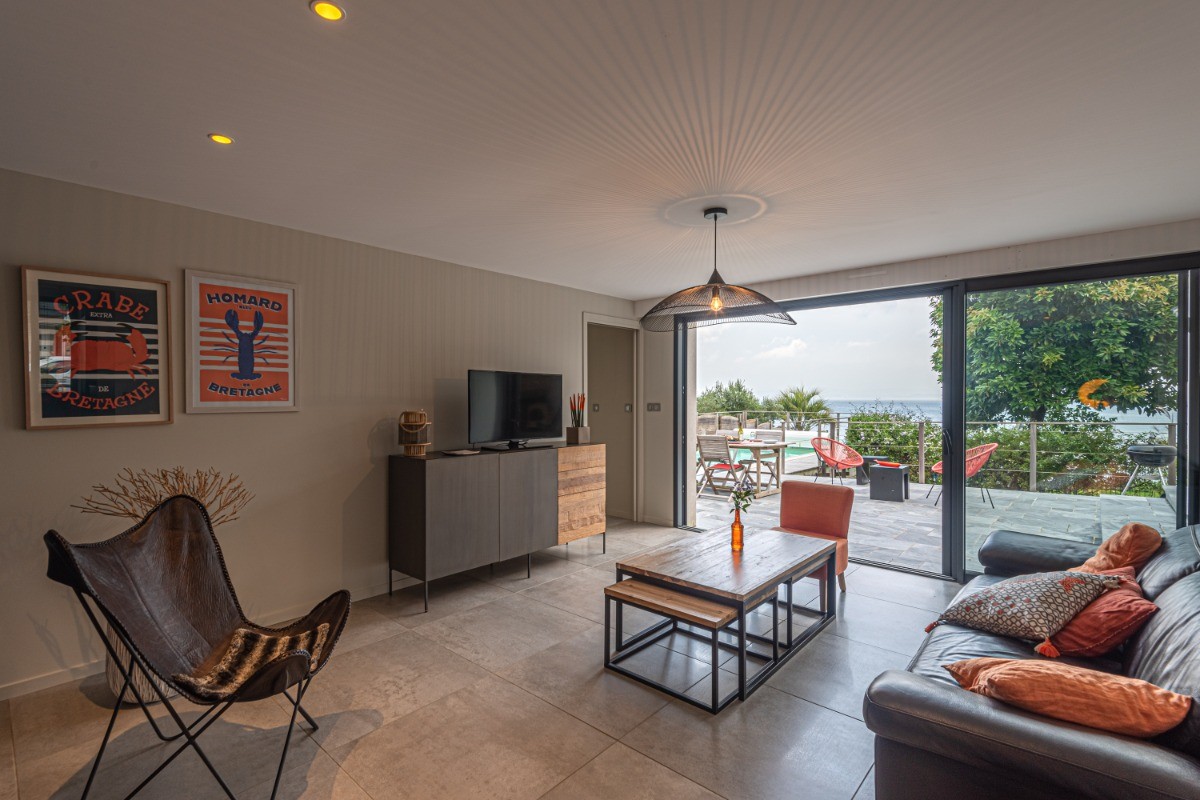 Salon avec direct à la terrasse