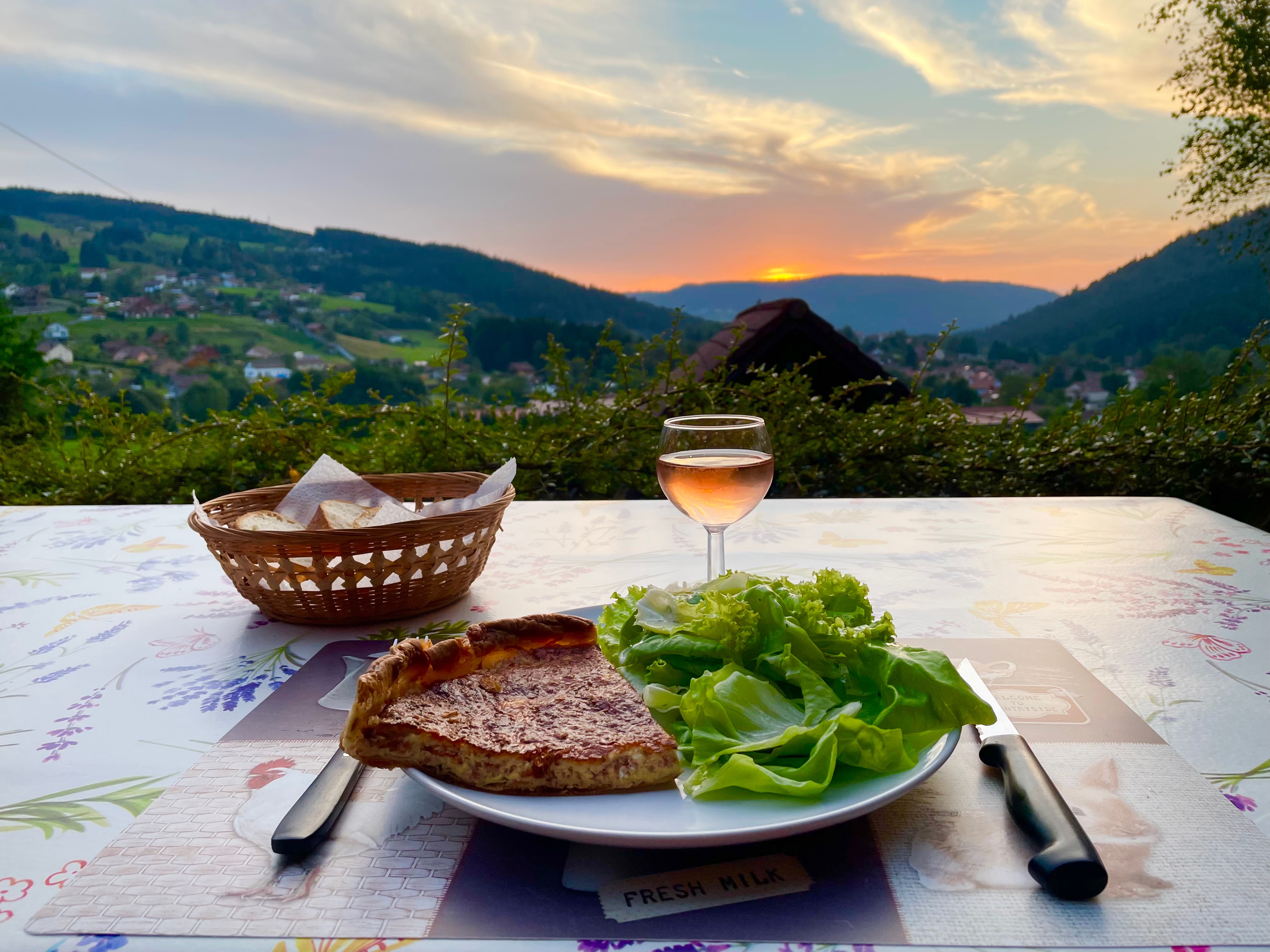 Dining on the terrace at dusk in summer